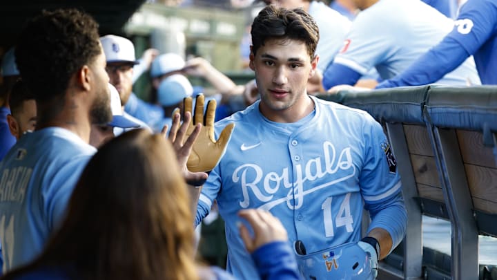 Jul 21, 2025; Chicago, Illinois, USA; Kansas City Royals right fielder Jac Caglianone (14) celebrates in the dugout after hitting a solo home run against the Chicago Cubs during the second inning at Wrigley Field. Mandatory Credit: Kamil Krzaczynski-Imagn Images Jul 21, 2025; Chicago, Illinois, USA; Kansas City Royals right fielder Jac Caglianone (14) celebrates in the dugout after hitting a solo home run against the Chicago Cubs during the second inning at Wrigley Field. Mandatory Credit: Kamil Krzaczynski-Imagn Images