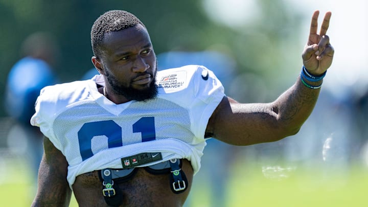 Indianapolis Colts defensive end Yannick Ngakoue (91) signals to fans during training camp Wednesday, Aug. 17, 2022, at Grand Park in Westfield, Ind.