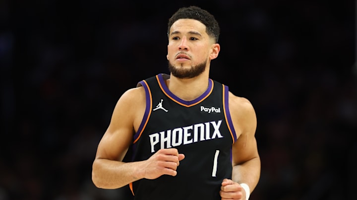 Apr 27, 2026; Phoenix, Arizona, USA; Phoenix Suns guard Devin Booker (1) against the Oklahoma City Thunder in the second half during game four of the first round of the 2026 NBA Playoffs at Mortgage Matchup Center. Mandatory Credit: Mark J. Rebilas-Imagn Images