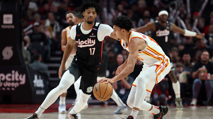 Nov 17, 2024; Portland, Oregon, USA; Portland Trail Blazers guard Shaedon Sharpe (17) defends Atlanta Hawks forward Zaccharie Risacher (10)  in the first half at Moda Center. Mandatory Credit: Jaime Valdez-Imagn Images