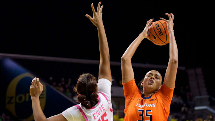 Illinois center Lety Vasconcelos, right, rebounds over Oregon forward Ehis Etute as the Oregon Ducks host the Illinois Fighting Illini on Feb. 4, 2026, at Matthew Knight Arena in Eugene, Oregon.
