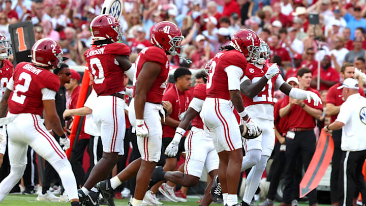 Oct 4, 2025; Tuscaloosa, Alabama, USA; Alabama Crimson Tide defensive back Keon Sabb (3) celebrates his interception with teammates during the second half against the Vanderbilt Commodores at Saban Field at Bryant-Denny Stadium. Oct 4, 2025; Tuscaloosa, Alabama, USA; Alabama Crimson Tide defensive back Keon Sabb (3) celebrates his interception with teammates during the second half against the Vanderbilt Commodores at Saban Field at Bryant-Denny Stadium.