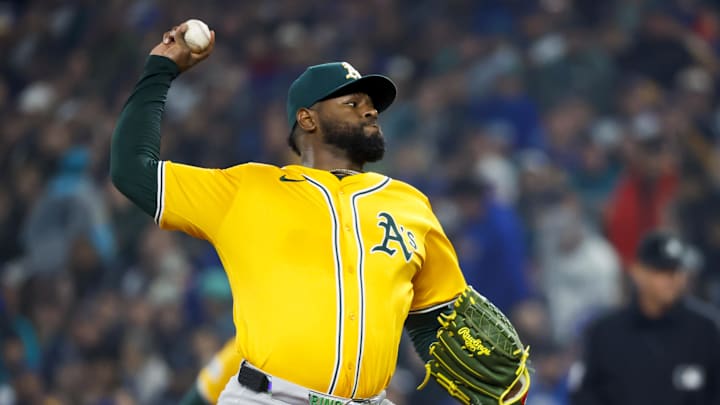 Mar 27, 2025; Seattle, Washington, USA; Athletics starting pitcher Luis Severino (40) throws against the Seattle Mariners during the first inning at T-Mobile Park. Mandatory Credit: Joe Nicholson-Imagn Images Mar 27, 2025; Seattle, Washington, USA; Athletics starting pitcher Luis Severino (40) throws against the Seattle Mariners during the first inning at T-Mobile Park. Mandatory Credit: Joe Nicholson-Imagn Images