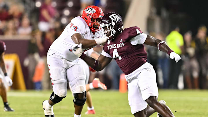 Sep 2, 2023; College Station, Texas, USA; Texas A&M Aggies defensive lineman Shemar Stewart (4) breaks past New Mexico Lobos offensive lineman Matthew Toilolo (74) during the fourth quarter at Kyle Field. Mandatory Credit: Maria Lysaker-Imagn Images