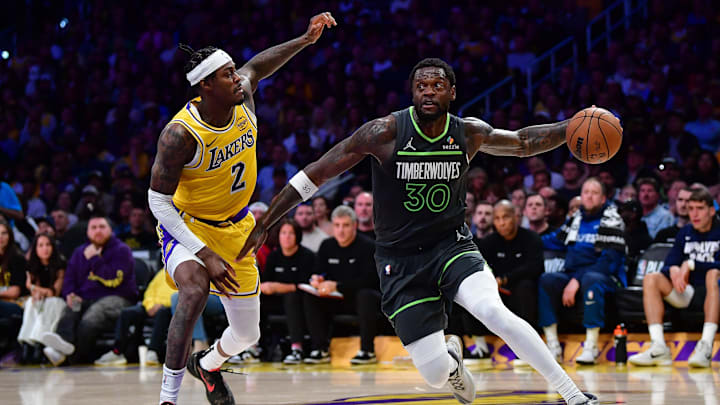 Apr 30, 2025; Los Angeles, California, USA; Minnesota Timberwolves forward Julius Randle (30) moves the ball against Los Angeles Lakers forward Jarred Vanderbilt (2) during the second half in game five of first round for the 2025 NBA Playoffs at Crypto.com Arena. Mandatory Credit: Gary A. Vasquez-Imagn Images Apr 30, 2025; Los Angeles, California, USA; Minnesota Timberwolves forward Julius Randle (30) moves the ball against Los Angeles Lakers forward Jarred Vanderbilt (2) during the second half in game five of first round for the 2025 NBA Playoffs at Crypto.com Arena. Mandatory Credit: Gary A. Vasquez-Imagn Images