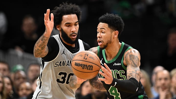 Jan 10, 2026; Boston, Massachusetts, USA; Boston Celtics guard Anfernee Simons (4) passes the ball against San Antonio Spurs forward Julian Champagne (30) during the first half at the TD Garden. Mandatory Credit: Brian Fluharty-Imagn Images Jan 10, 2026; Boston, Massachusetts, USA; Boston Celtics guard Anfernee Simons (4) passes the ball against San Antonio Spurs forward Julian Champagne (30) during the first half at the TD Garden. Mandatory Credit: Brian Fluharty-Imagn Images