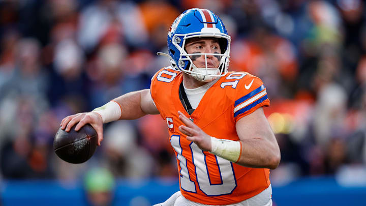 Jan 5, 2025; Denver, Colorado, USA; Denver Broncos quarterback Bo Nix (10) looks to pass in the third quarter against the Kansas City Chiefs at Empower Field at Mile High. Mandatory Credit: Isaiah J. Downing-Imagn Images