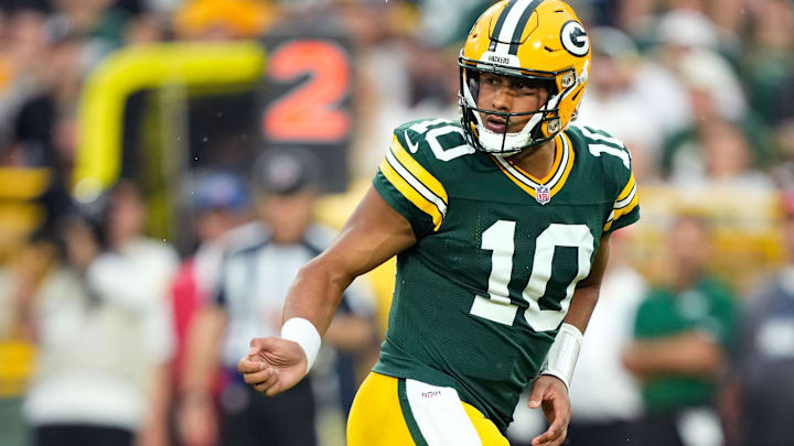 Aug 9, 2025; Green Bay, Wisconsin, USA;  Green Bay Packers quarterback Jordan Love (10) watches the ball after handing it off during the first quarter against the New York Jets at Lambeau Field. Mandatory Credit: Kayla Wolf-Imagn Images