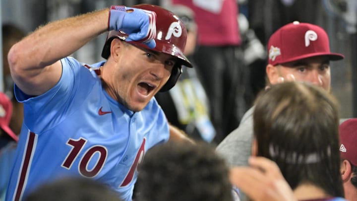 Philadelphia Phillies catcher J.T. Realmuto celebrates after hitting a solo home run