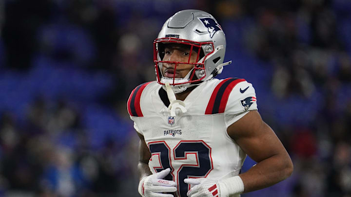 Dec 21, 2025; Baltimore, Maryland, USA;  New England Patriots running back Treveyon Henderson (32) warms up prior to the game against the Baltimore Ravens at M&T Bank Stadium. 