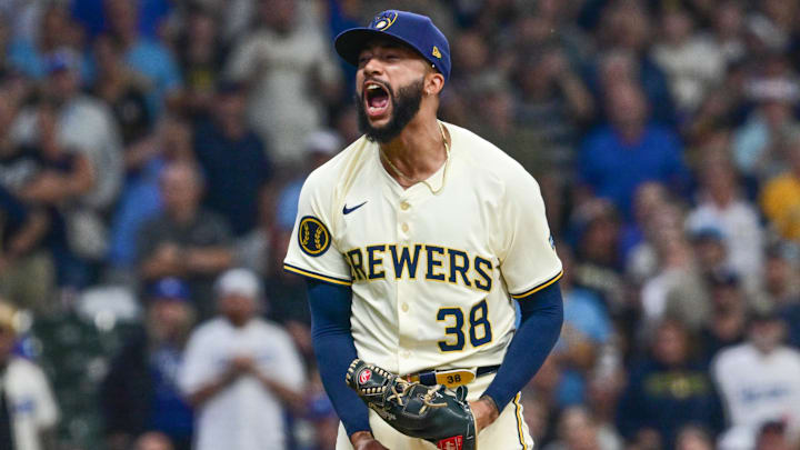 Aug 15, 2024; Milwaukee, Wisconsin, USA; Milwaukee Brewers pitcher Devin Williams (38) reacts after striking out Los Angeles Dodgers designated hitter Shohei Ohtani (not pictured) in the ninth inning to earn a save at American Family Field. Mandatory Credit: Benny Sieu-Imagn Images