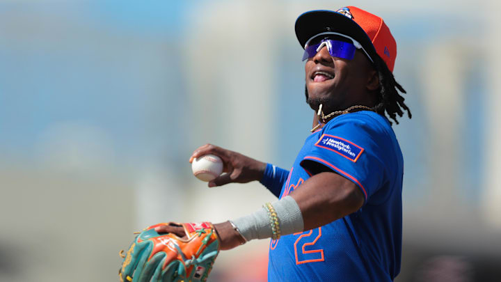 Feb 25, 2025; West Palm Beach, Florida, USA; New York Mets shortstop Luisangel Acuna (2) throws a baseball into the stands after the second inning against the Houston Astros at CACTI Park of the Palm Beaches. 