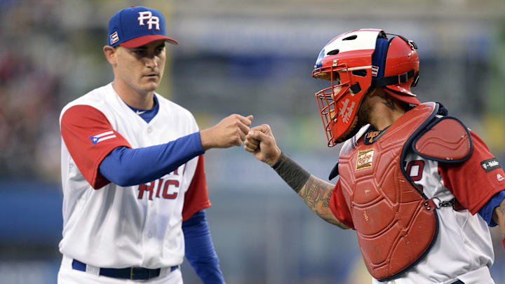 Mar 22, 2017; Los Angeles, CA, USA; Puerto Rico catcher Yadier Molina (4) greets pitcher Seth Lugo (67) following the second inning against USA during the 2017 World Baseball Classic at Dodger Stadium. Mandatory Credit: Gary A. Vasquez-Imagn Images Mar 22, 2017; Los Angeles, CA, USA; Puerto Rico catcher Yadier Molina (4) greets pitcher Seth Lugo (67) following the second inning against USA during the 2017 World Baseball Classic at Dodger Stadium. Mandatory Credit: Gary A. Vasquez-Imagn Images