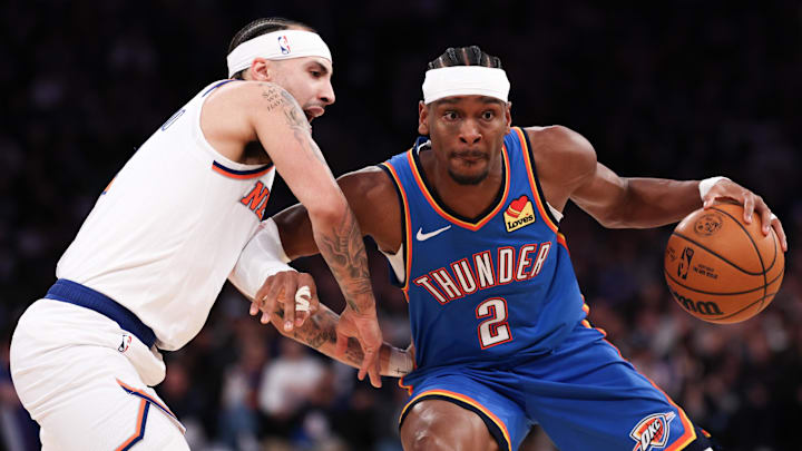 Mar 4, 2026; New York, New York, USA; Oklahoma City Thunder guard Shai Gilgeous-Alexander (2) is guarded by New York Knicks guard Jose Alvarado (5) during the first half at Madison Square Garden. Mandatory Credit: Vincent Carchietta-Imagn Images