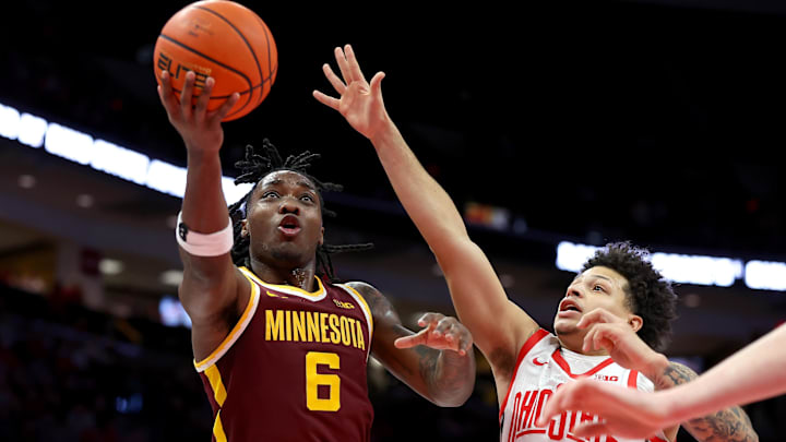 Jan 20, 2026; Columbus, Ohio, USA; Minnesota Golden Gophers guard Langston Reynolds (6) drives to the basket as Ohio State Buckeyes guard John Mobley Jr. (0) defends during the first half at Value City Arena.