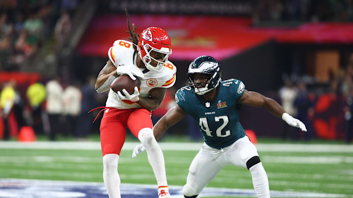 Feb 9, 2025; New Orleans, LA, USA;  Kansas City Chiefs wide receiver DeAndre Hopkins (8) catches a pass against Philadelphia Eagles linebacker Oren Burks (42) in the third quarter in Super Bowl LIX at Ceasars Superdome. Mandatory Credit: Mark J. Rebilas-Imagn Images