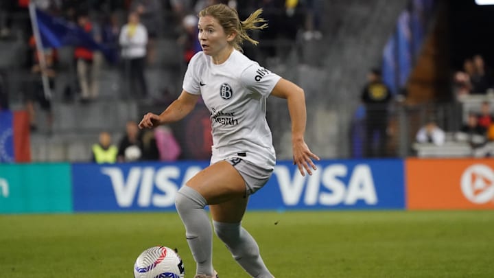 Bay FC defender Maddie Moreau (24) dribbles the ball during the second half against the Orlando Pride at PayPal Park