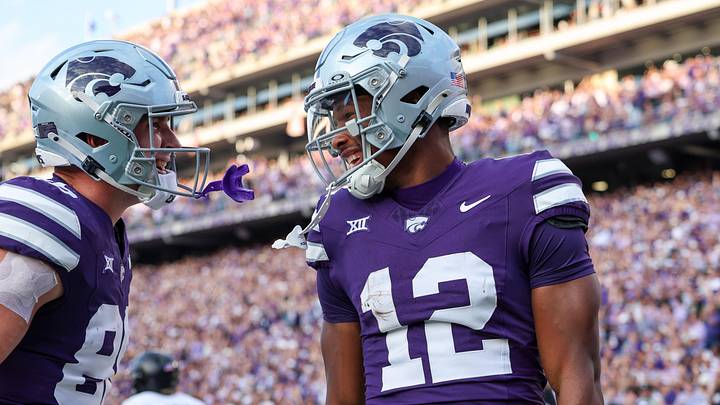 Sep 6, 2025; Manhattan, Kansas, USA; Kansas State Wildcats wide receiver Jaron Tibbs (12) and tight end Garrett Oakley (86) celebrate a touchdown catch by Tibbs during the second quarter against the Army Black Knights at Bill Snyder Family Football Stadium. Mandatory Credit: Scott Sewell-Imagn Images Sep 6, 2025; Manhattan, Kansas, USA; Kansas State Wildcats wide receiver Jaron Tibbs (12) and tight end Garrett Oakley (86) celebrate a touchdown catch by Tibbs during the second quarter against the Army Black Knights at Bill Snyder Family Football Stadium. Mandatory Credit: Scott Sewell-Imagn Images