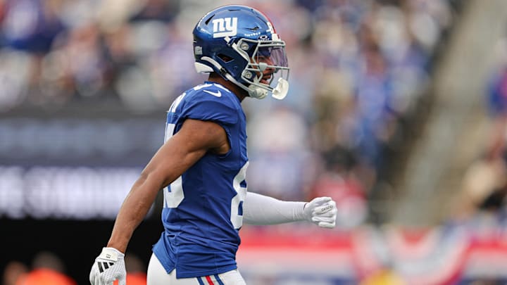 Dec 29, 2024; East Rutherford, New Jersey, USA; New York Giants wide receiver Darius Slayton (86) celebrates after scoring a touchdown reception during the first half against the Indianapolis Colts at MetLife Stadium.  
