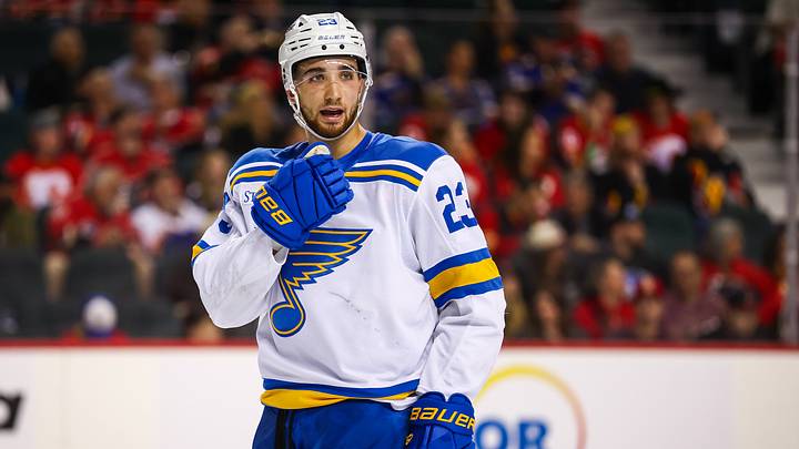 Mar 18, 2026; Calgary, Alberta, CAN; St. Louis Blues defenseman Logan Mailloux (23) against the Calgary Flames during the third period at Scotiabank Saddledome. Mandatory Credit: Sergei Belski-Imagn Images Mar 18, 2026; Calgary, Alberta, CAN; St. Louis Blues defenseman Logan Mailloux (23) against the Calgary Flames during the third period at Scotiabank Saddledome. Mandatory Credit: Sergei Belski-Imagn Images