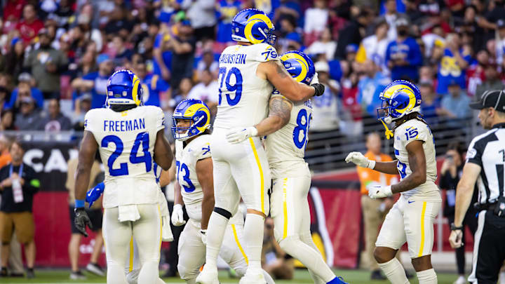Nov 26, 2023; Glendale, Arizona, USA; Los Angeles Rams tight end Tyler Higbee (89) celebrates a touchdown with offensive lineman Rob Havenstein (79) against the Arizona Cardinals in the first half at State Farm Stadium. Mandatory Credit: Mark J. Rebilas-Imagn Images