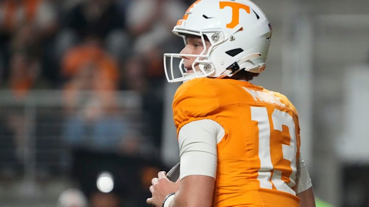 Despite transferring to USF from Tennessee just before fall camp opened, quarterback Gaston Moore is turning heads