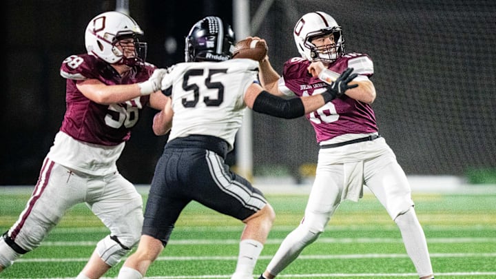 Dowling's Joey Nahas (16) looks to throw deep to a receiver downfield on Friday, Nov. 8, 2024, at Mediacom Stadium.