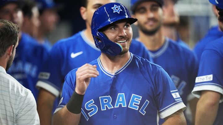 Mar 10, 2026; Miami, FL, United States;  Israel first baseman Spencer Horwitz (13) celebrates after scoring a run in the sixth inning against the Netherlands at loanDepot Park. Mandatory Credit: Jim Rassol-Imagn Images
