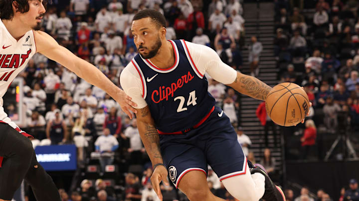 Jan 13, 2025; Inglewood, California, USA; LA Clippers guard Norman Powell (24) drives against Miami Heat guard Jaime Jaquez Jr. (11) during the second quarter at Intuit Dome. Mandatory Credit: Jason Parkhurst-Imagn Images Jan 13, 2025; Inglewood, California, USA; LA Clippers guard Norman Powell (24) drives against Miami Heat guard Jaime Jaquez Jr. (11) during the second quarter at Intuit Dome. Mandatory Credit: Jason Parkhurst-Imagn Images