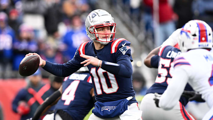 Jan 5, 2025; Foxborough, Massachusetts, USA; New England Patriots quarterback Drake Maye (10) looks to throw against the Buffalo Bills during the first half at Gillette Stadium. Mandatory Credit: Brian Fluharty-Imagn Images