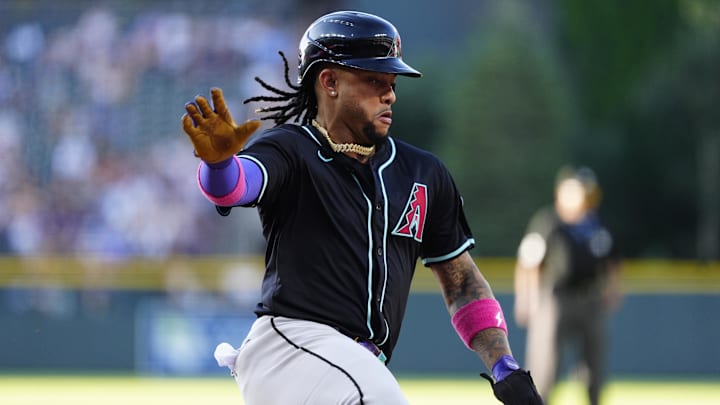 Jun 21, 2025; Denver, Colorado, USA; Arizona Diamondbacks second baseman Ketel Marte (4) scores a run in in the first inning against the Colorado Rockies at Coors Field. Mandatory Credit: Ron Chenoy-Imagn Images