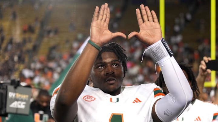 Oct 5, 2024; Berkeley, California, USA; Miami Hurricanes quarterback Cam Ward (1) gestures after defeating the California Golden Bears at California Memorial Stadium. Mandatory Credit: Darren Yamashita-Imagn Images Oct 5, 2024; Berkeley, California, USA; Miami Hurricanes quarterback Cam Ward (1) gestures after defeating the California Golden Bears at California Memorial Stadium. Mandatory Credit: Darren Yamashita-Imagn Images
