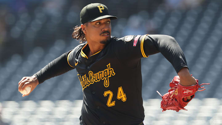 Sep 17, 2025; Pittsburgh, Pennsylvania, USA;  Pittsburgh Pirates starting pitcher Johan Oviedo (24) delivers a pitch against the Chicago Cubs during the first inning at PNC Park. Mandatory Credit: Charles LeClaire-Imagn Images