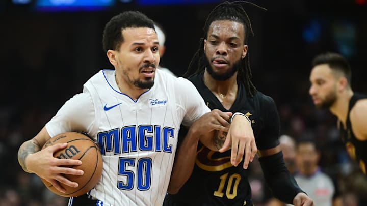 May 5, 2024; Cleveland, Ohio, USA; Orlando Magic guard Cole Anthony (50) drives to the basket against Cleveland Cavaliers guard Darius Garland (10) during the first half in game seven of the first round for the 2024 NBA playoffs at Rocket Mortgage FieldHouse. Mandatory Credit: Ken Blaze-Imagn Images