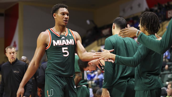 Nov 28, 2025; Kissimmee, FL, USA; Miami (FL) Hurricanes forward Malik Reneau (5) reacts to the beach after being subbed out against the Georgetown Hoyas in the second half during the ESPN Events Invitational at State Farm Field House. Mandatory Credit: Nathan Ray Seebeck-Imagn Images