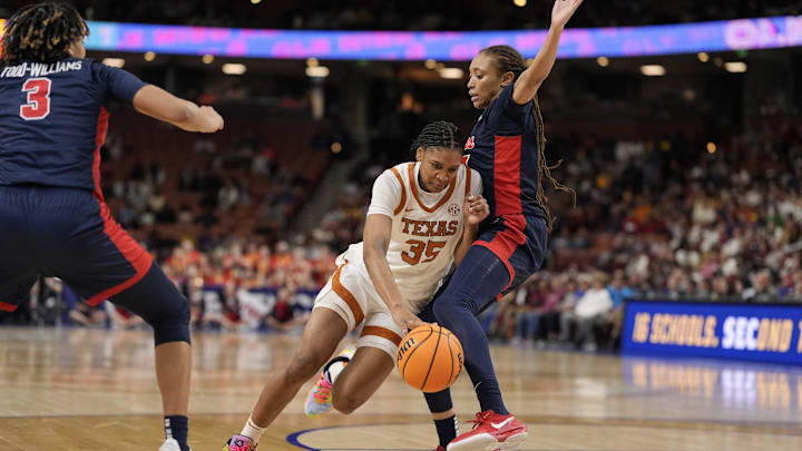 Mar 7, 2025; Greenville, SC, USA; Texas Longhorns forward Madison Booker (35) drives to the basket against the Ole Miss Rebels during the second half at Bon Secours Wellness Arena. Mandatory Credit: Jim Dedmon-Imagn Images