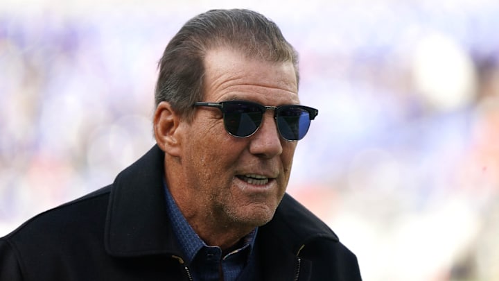 Baltimore Ravens owner Steve Bisciotti on the field prior to the game against the Denver Broncos.