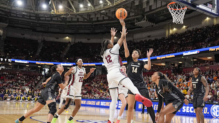 South Carolina Gamecocks guard MiLaysia Fulwiley (12) shoots over Vanderbilt Commodores forward Aiyana Mitchell (14) during the second half at Bon Secours Wellness Arena.