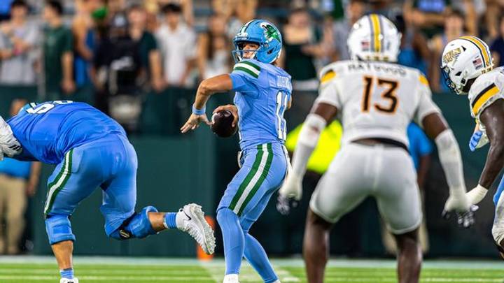 Tulane QB Trace Johnson tosses completion Tulane QB Trace Johnson tosses completion