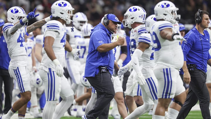 Dec 28, 2024; San Antonio, TX, USA; Brigham Young Cougars head coach Kalani Sitake reacts after a play during the second quarter against the Colorado Buffaloes at Alamodome. Mandatory Credit: Troy Taormina-Imagn Images