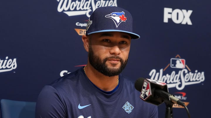 Oct 28, 2025; Los Angeles, California, USA; Toronto Blue Jays shortstop Isiah Kiner-Falefa (7) speaks in a press conference before game four of the 2025 MLB World Series against the Los Angeles Dodgers at Dodger Stadium. Mandatory Credit: Kirby Lee-Imagn Images