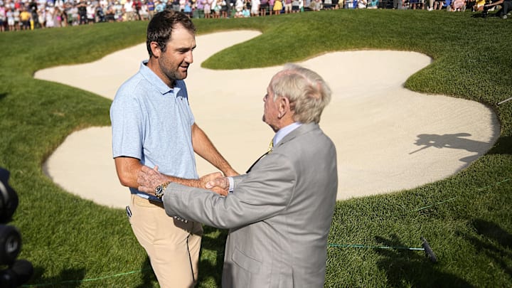 Scottie Scheffler, visiting with Jack Nicklaus after winning the 2025  Memorial Tournament, is back to defend. 