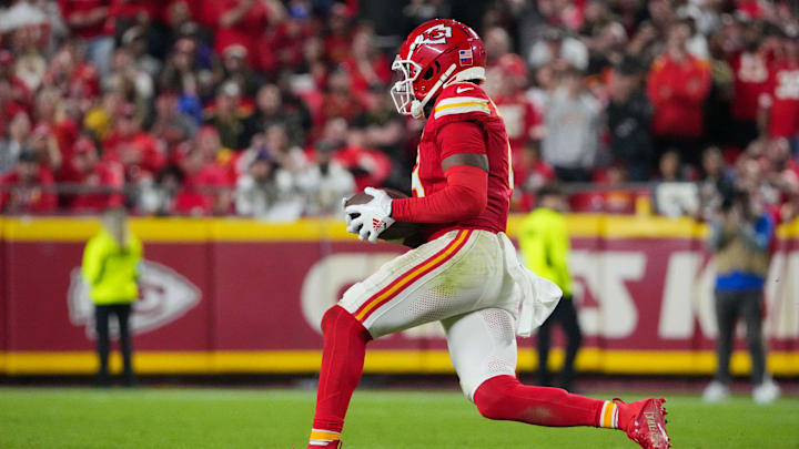 Oct 7, 2024; Kansas City, Missouri, USA; Kansas City Chiefs wide receiver JuJu Smith-Schuster (9) runs the ball against the New Orleans Saints during the second half at GEHA Field at Arrowhead Stadium.