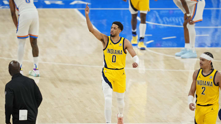 Jun 5, 2025; Oklahoma City, Oklahoma, USA; Indiana Pacers guard Tyrese Haliburton (0) reacts after a play against the Oklahoma City Thunder during the fourth quarter in game one of the 2025 NBA Finals at Paycom Center. Mandatory Credit: Kyle Terada-Imagn Images Jun 5, 2025; Oklahoma City, Oklahoma, USA; Indiana Pacers guard Tyrese Haliburton (0) reacts after a play against the Oklahoma City Thunder during the fourth quarter in game one of the 2025 NBA Finals at Paycom Center. Mandatory Credit: Kyle Terada-Imagn Images