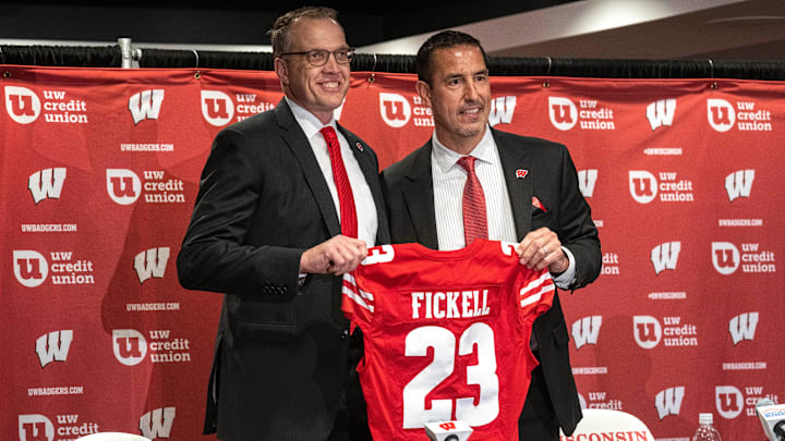 Wisconsin head football coach Luke Fickell, right, poses with athletic director Chris McIntosh. 