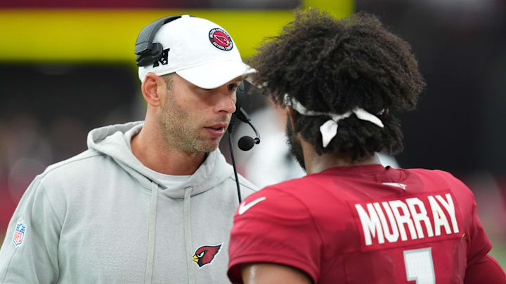 Sep 15, 2024; Glendale, Arizona, USA; Arizona Cardinals head coach Jonathan Gannon talks with Arizona Cardinals quarterback Kyler Murray (1) during the second half against the Los Angeles Rams at State Farm Stadium. Mandatory Credit: Joe Camporeale-Imagn Images
