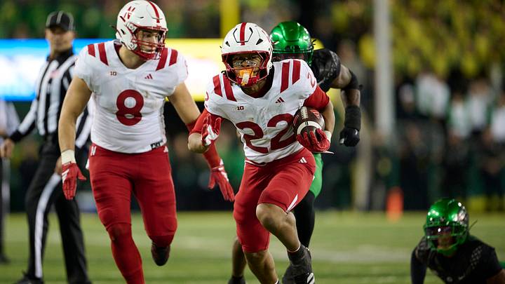 Isaiah Mozee carries the ball during the second half. Isaiah Mozee carries the ball during the second half.