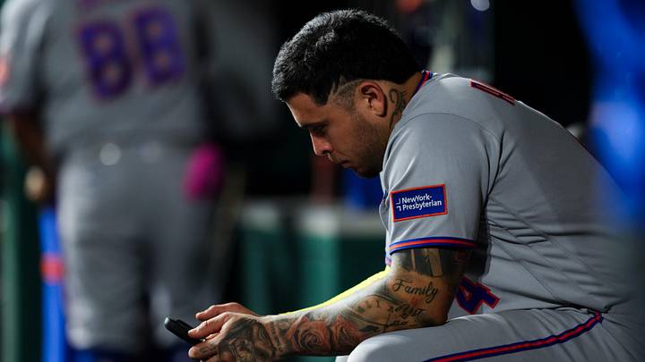 Jun 16, 2026; Cincinnati, Ohio, USA; New York Mets catcher Francisco Alvarez (4) looks at a tablet as he sits in the dugout after the game against the Cincinnati Reds at Great American Ball Park. Mandatory Credit: Aaron Doster-Imagn Images Jun 16, 2026; Cincinnati, Ohio, USA; New York Mets catcher Francisco Alvarez (4) looks at a tablet as he sits in the dugout after the game against the Cincinnati Reds at Great American Ball Park. Mandatory Credit: Aaron Doster-Imagn Images