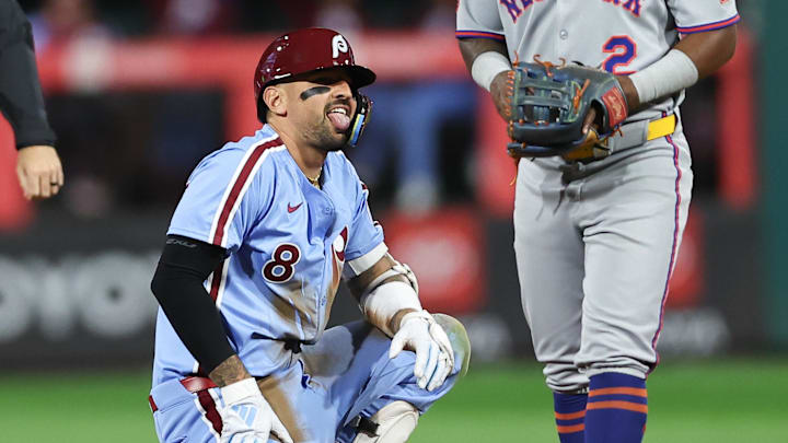 Sep 11, 2025; Philadelphia, Pennsylvania, USA; Philadelphia Phillies outfielder Nick Castellanos (8) reacts next to New York Mets second base Luisangel Acuna (2) after hitting a double during the sixth inning at Citizens Bank Park. Mandatory Credit: Bill Streicher-Imagn Images