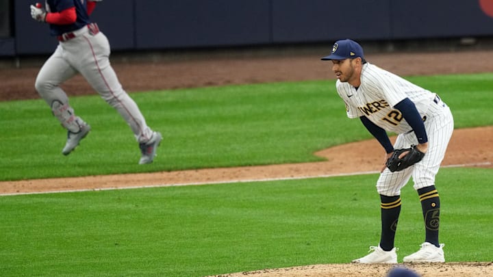 Apr 23, 2023; Milwaukee Brewers relief pitcher Javy Guerra (12) gives up a grand slam home run to